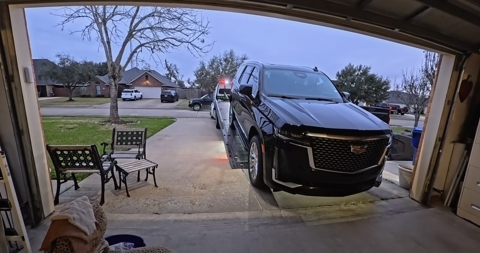 24/7 emergency towing service with professional lighting and safety equipment Professional emergency towing truck with emergency lights responding to nighttime call